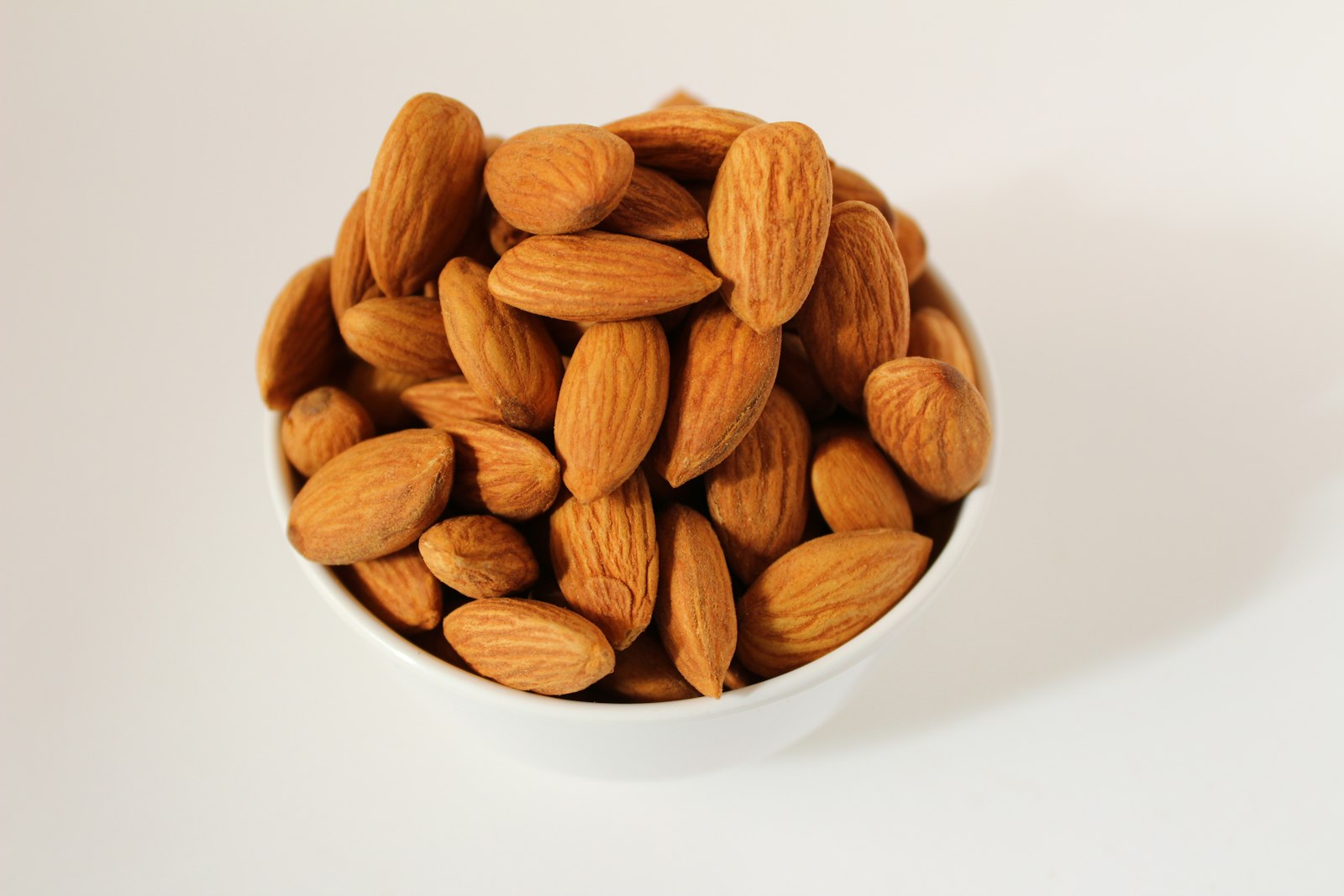 Almonds in a white bowl