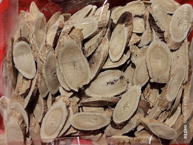 Dried sliced astragalus (huang qi) root