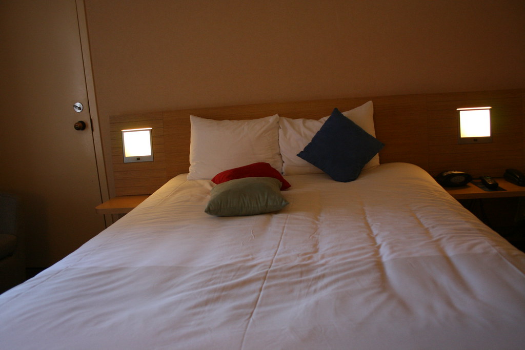 A bed with pillows