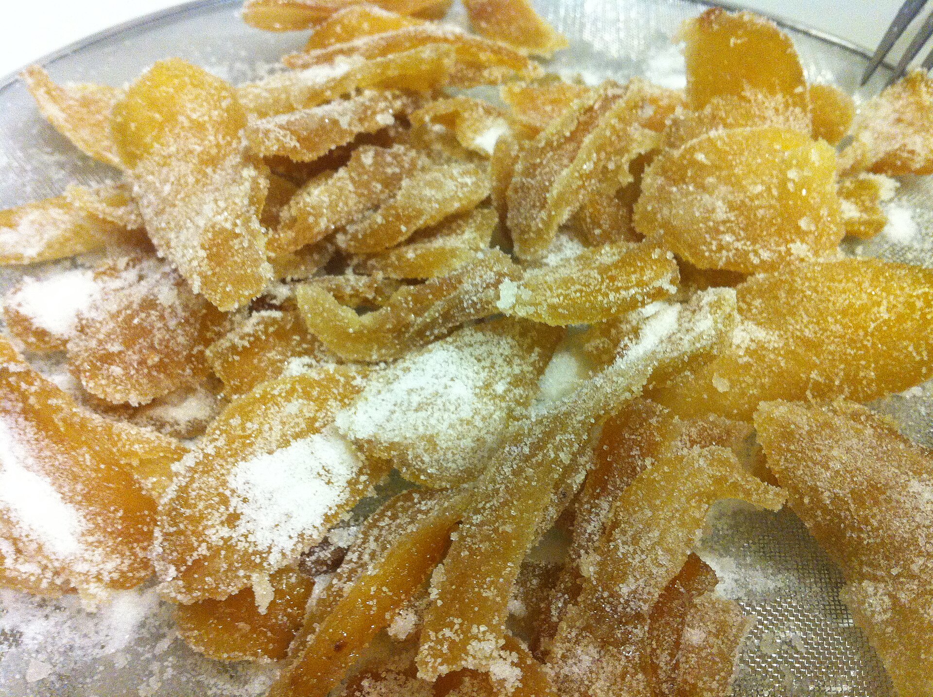 Pieces of sugar-coated candied ginger
