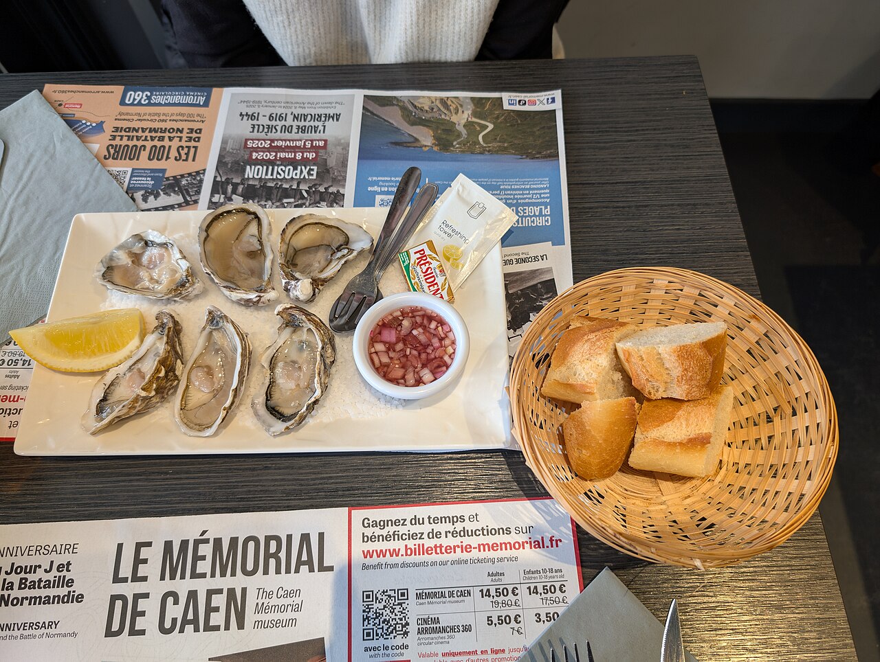 A plate of six fresh oysters on the half shell; oysters are the richest food source of zinc