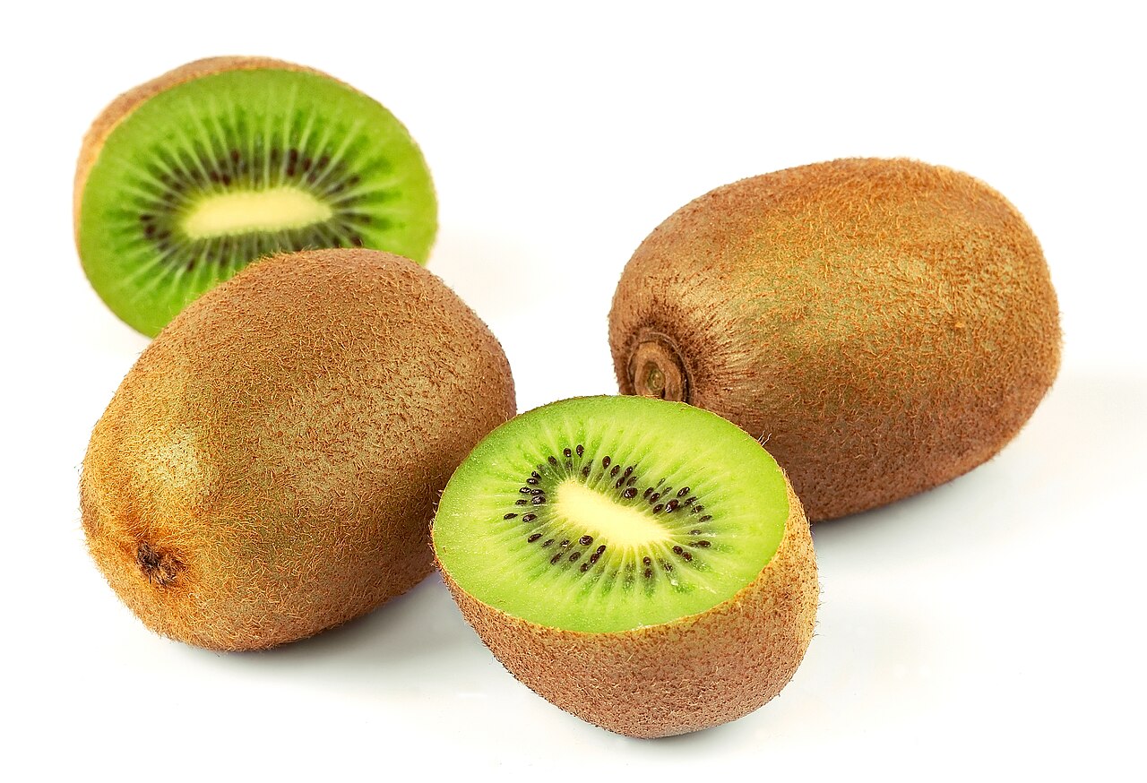 Whole and halved kiwifruit