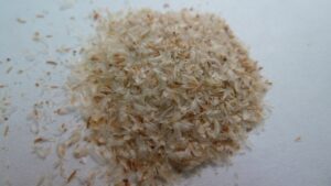 A pile of pale psyllium seed husks