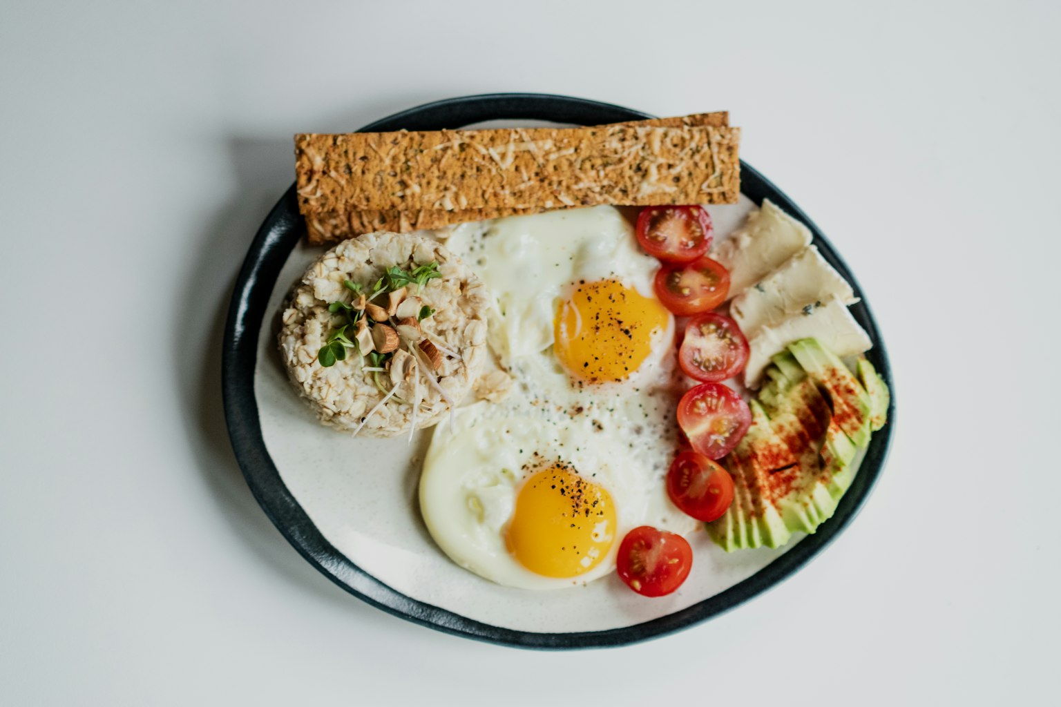 Egg and vegetable salad on a white plate